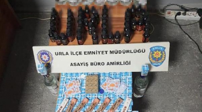 İzmir'de markete 'kaçak sigara ve içki' baskını