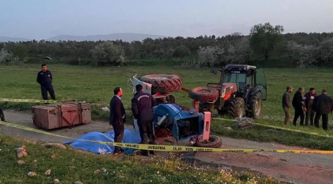 Devrilen traktörün altında kalan 2 kişi öldü